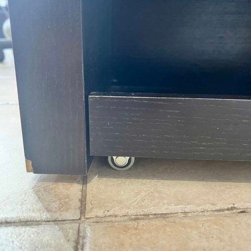 Wooden furniture with glass surface and two shelves on wheels used