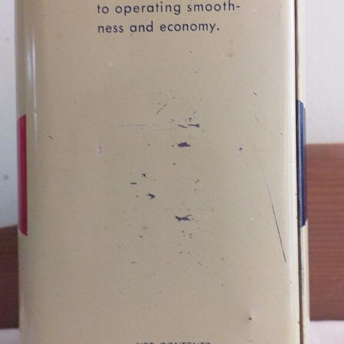 Old metal containers set with Mobil, ZAAE and Petrolatum Liquid