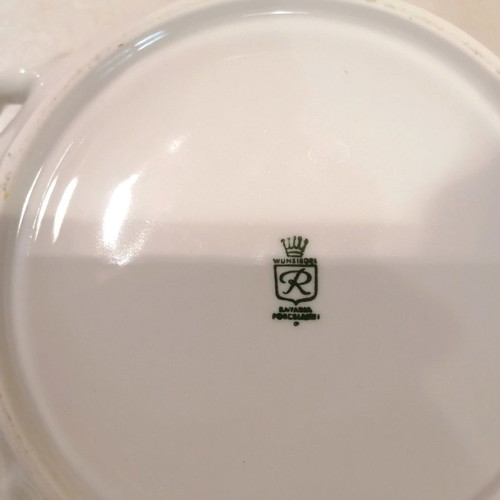 Porcelain soup tureen used with gold floral details