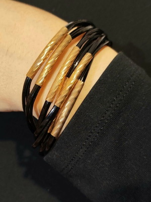 Bracelet new in black and gold with magnetic clasp