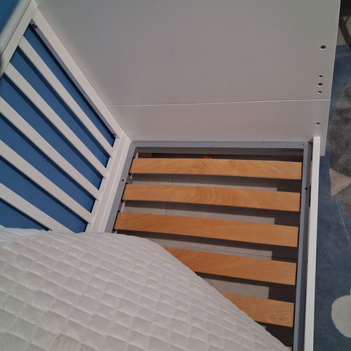 Baby cot with rails, like new, includes mattress and protector