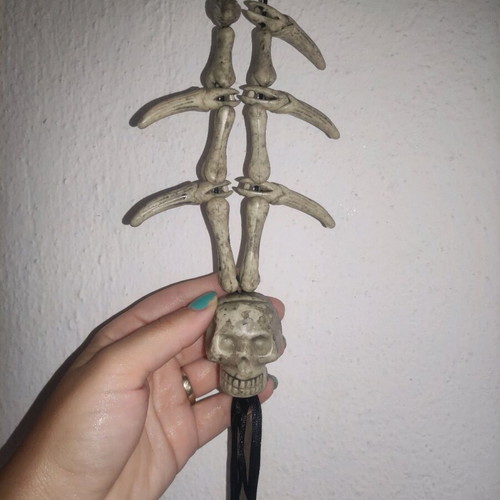 Halloween hanging decoration used with bone and skull appearance