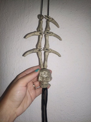 Halloween hanging decoration used with bone and skull appearance