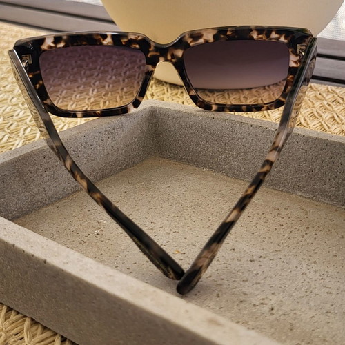 Rebecca Blu sunglasses new with case black and beige