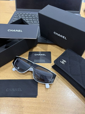 Chanel sunglasses new, black and white