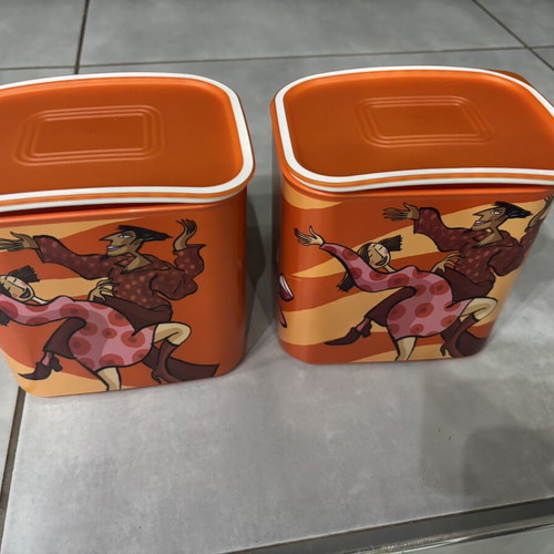 Tupperware canister with figures