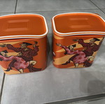 Tupperware canister with figures