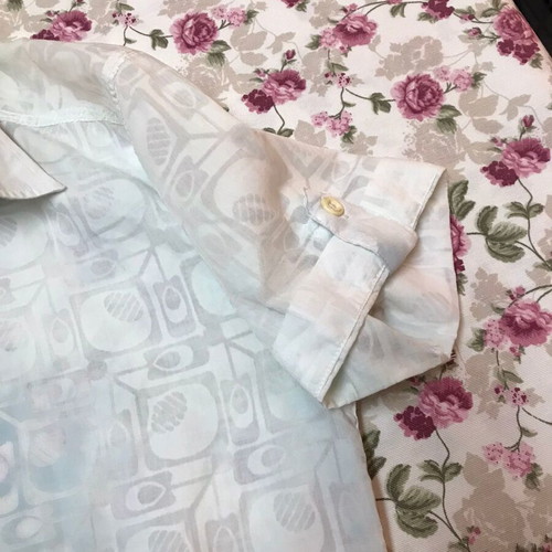 Women's shirt used, size small, transparent fabric, white