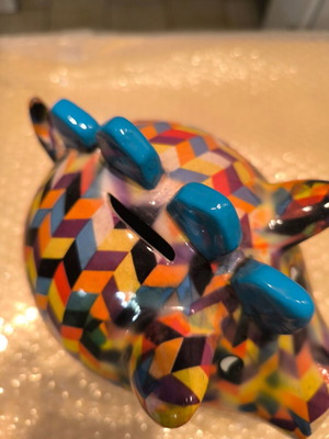 Piggy bank colorful in pig shape like new