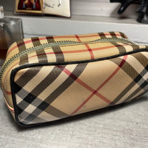 Burberry luxury toiletry bag used with defects