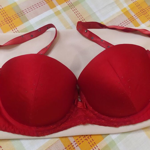 Bra used red with straps decorated with rhinestones