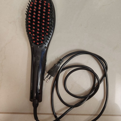 Electric Hair Brush used, heats up to 230°C