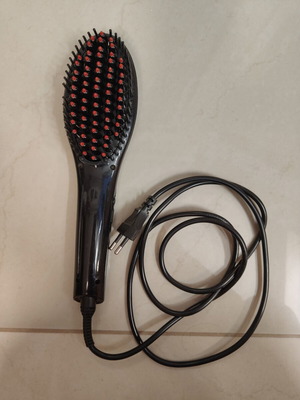 Electric Hair Brush used, heats up to 230°C