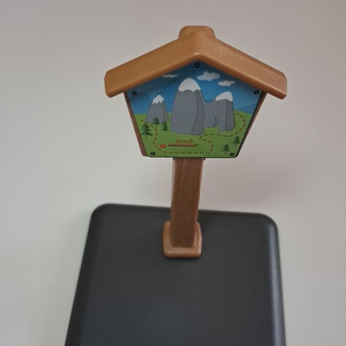 Playmobil trail sign with mountain route map and base