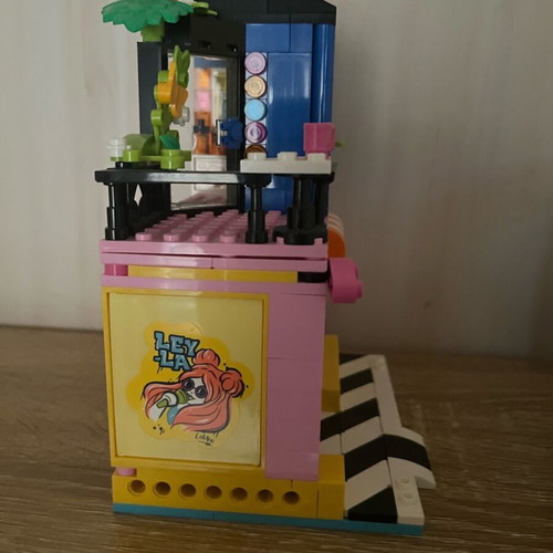 Lego Friends set with several missing pieces without figures, box, and instructions