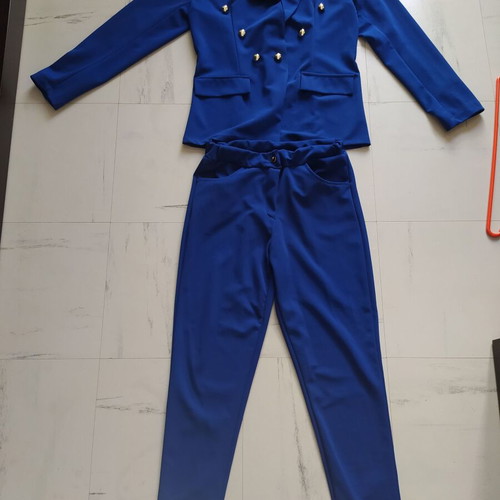 Set jacket and trousers like new from thin fabric blue