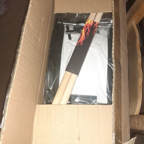Drum new with strap and drumsticks, regular size