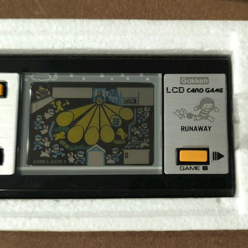 Gakken Runaway LCD Card Game like new, complete in box