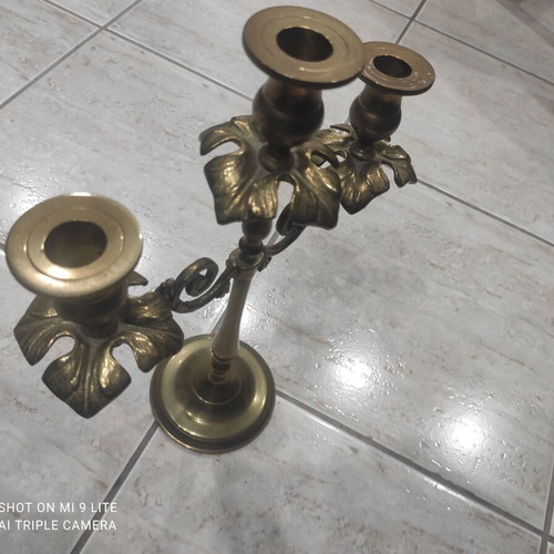 Vintage brass three-arm candlestick used with leaf decoration