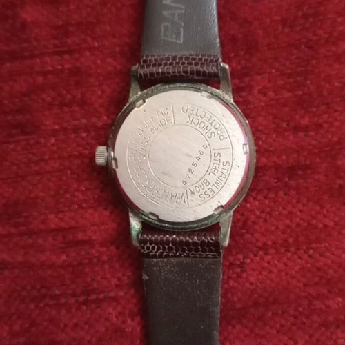 Technos vintage manual wind watch used, brown strap