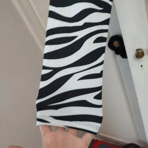 Long-sleeve zebra print bodysuit with V-neck and knot, like new