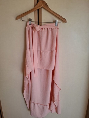 Pink maxi skirt with asymmetric ruffle hem and waist belt, used