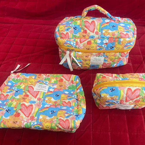 Set of three toiletry bags new, multicolored, various sizes