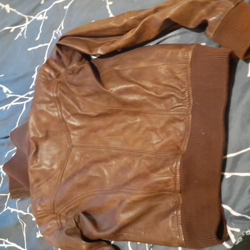 Brown leather women's jacket used with broken zipper