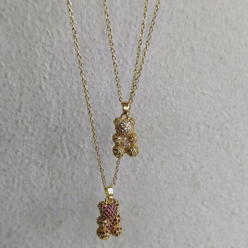 Teddy bear necklace gold color like new, sold together