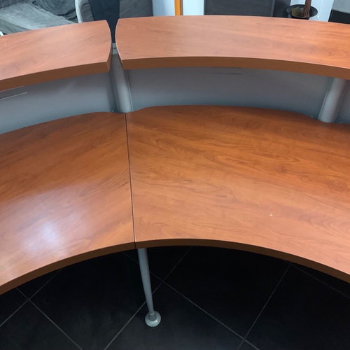 Reception desk used with metal perforated front panel