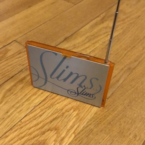 Karelia Slims promotional radio like new, orange vintage portable