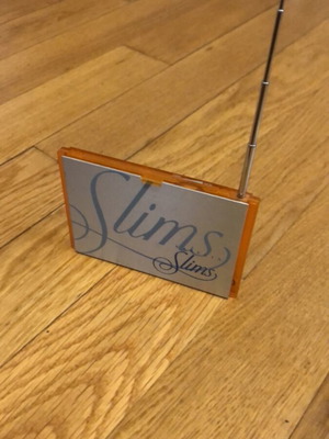 Karelia Slims promotional radio like new, orange vintage portable