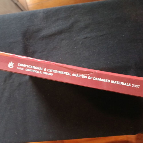Computational & Experimental Analysis of Damaged Materials book like new with signature