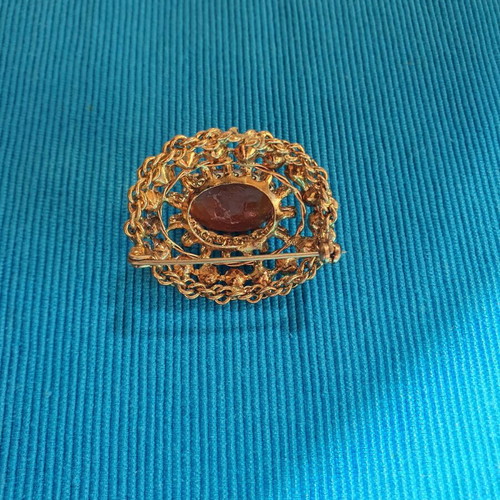 Vintage brooch used, gold color with crystals and cabochon