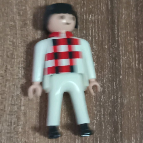 Playmobil figure with white outfit and checkered pattern like new
