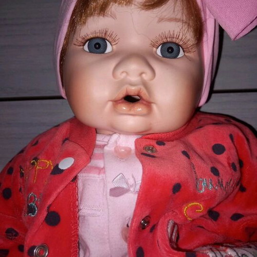 Porcelain doll like new in very good condition