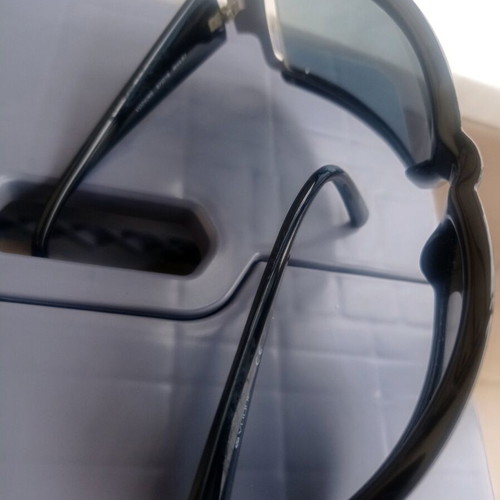 Vogue sunglasses used, black with scratch on lens