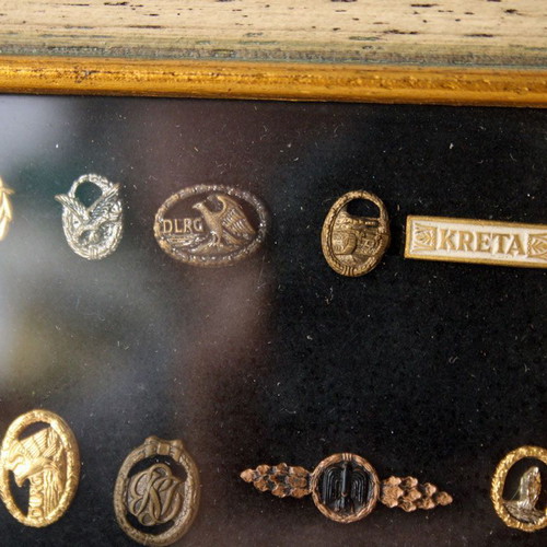 Frame with 27 old German Nazi military badges from World War II like new