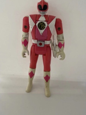 Pink Power Ranger figure used with weapon