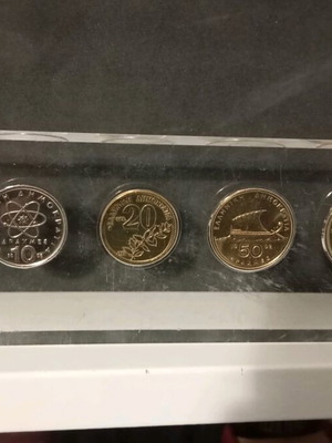 Drachmas in plexiglass new, 22x7cm