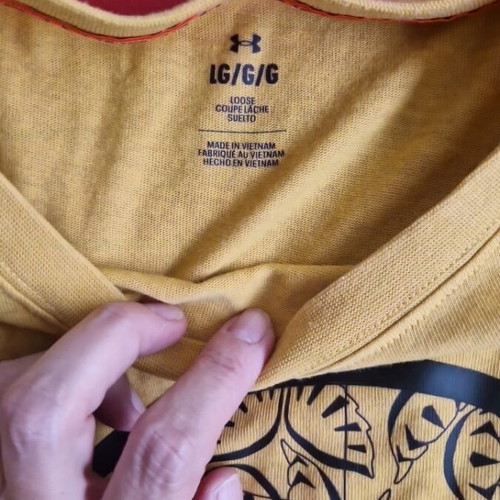 Under Armour T-shirt like new, yellow with logo