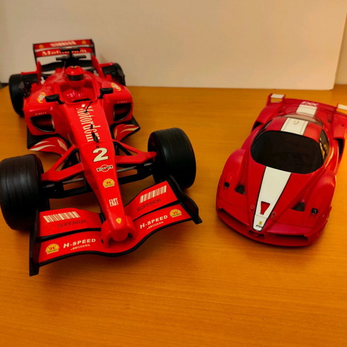 Formula and Ferrari toy cars used, set of 2, battery operated