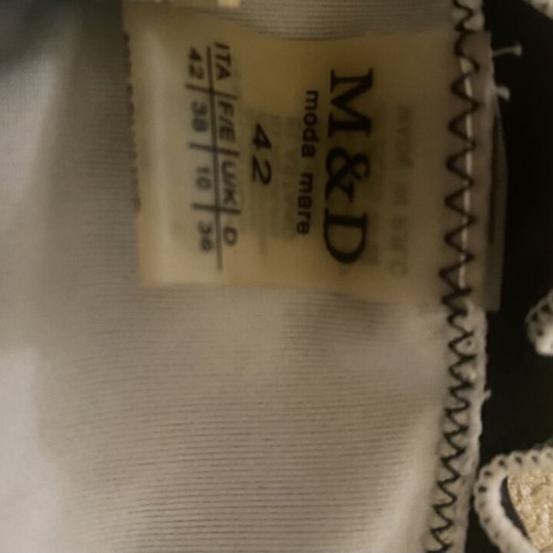 M&D black swimsuit used, fits small and medium sizes