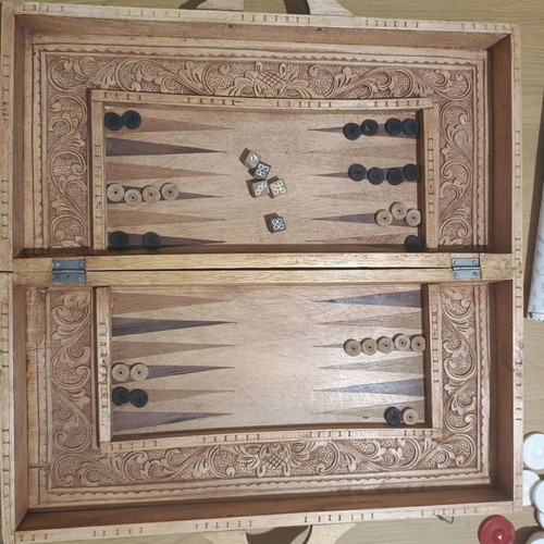 Carved backgammon/chess used with wooden Aztec-style pieces