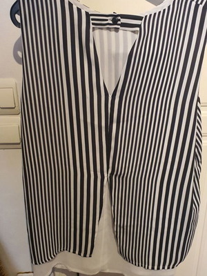 Paranoia sleeveless women's top size M like new, black and white stripes