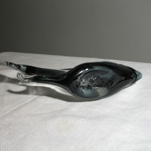 Glass decorative fish used with small tail chip