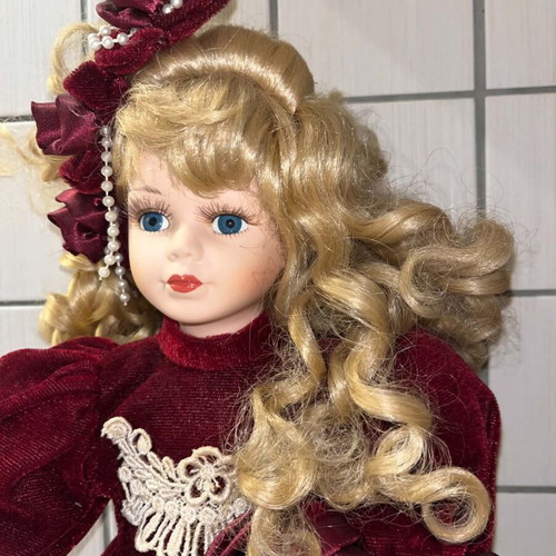 Porcelain doll Victorian style with burgundy velvet dress like new