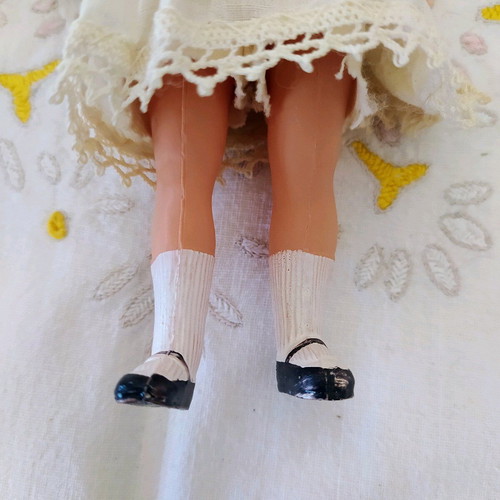 Celluloid collectible doll with stamp and numbering 175