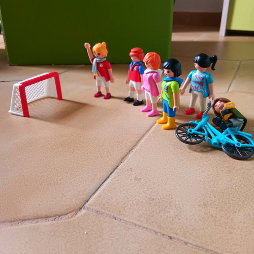 Playmobil like new, 6 figures, bicycle and football goal