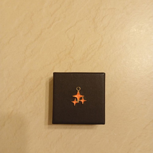 Pendant with star design, gold plated, new